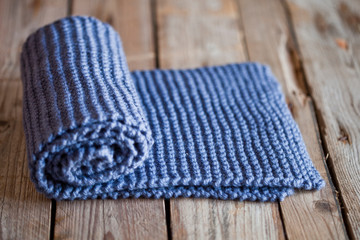 Hand knitted blue scarf.