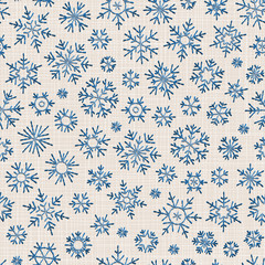 Seamless embroidery snowflakes background.