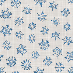 Seamless embroidery snowflakes background.