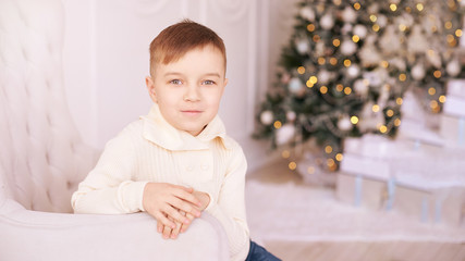 Brother and sister. New Year xmas child. Christmas eve holiday. interior. Beautiful portrait. Little boy. Horizontally