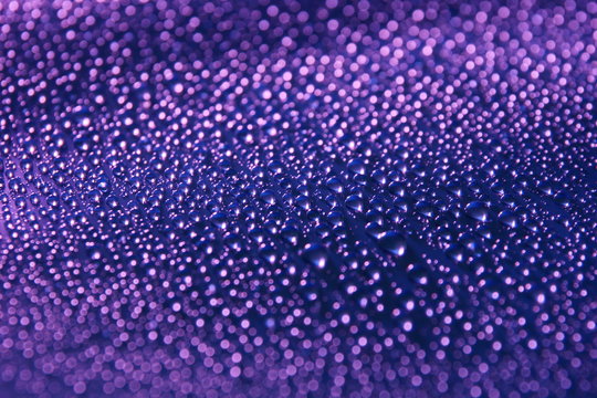 water drops abstract holiday background purple