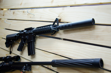 Gun wall rack with rifles