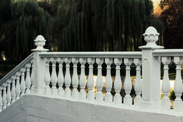 exterior architectural concept of soft focus white stone fence in outdoor park place for walking