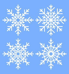 Naklejka na ściany i meble Vector set of four white winter snowflakes on a blue background
