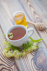 cup of linden tea and linden honey