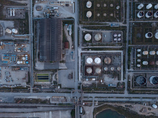 Aerial view of twilight of oil refinery ,Shot from drone of Oil refinery and Petrochemical plant at dusk.