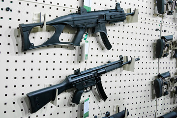 Gun wall rack with rifles