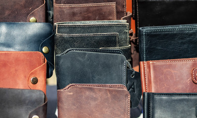 A lot of leather wallets