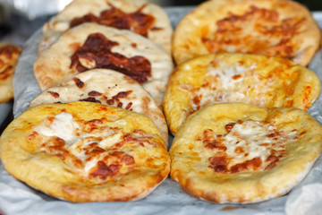Khachapuri in foil close-up