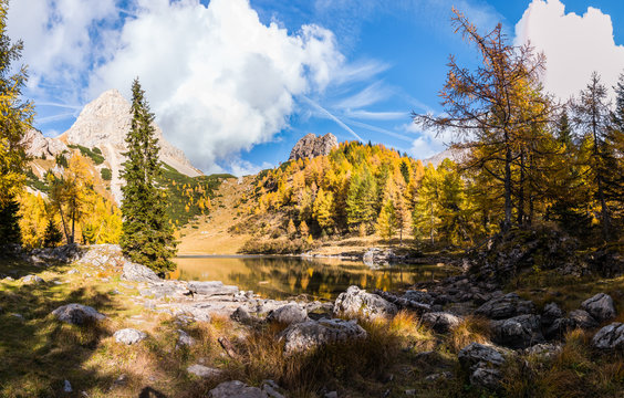 Colorful autumn morning in the mountains. Colourful autumn morning in mountain lake. Colorful autumn landscape.