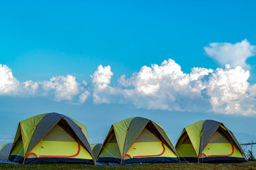 Tent and background sky and mountain views.
