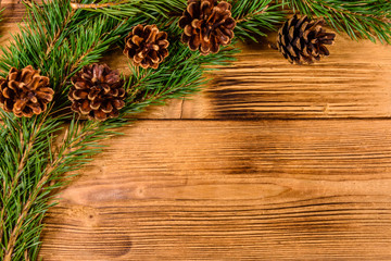 Fir tree branches on a wooden table