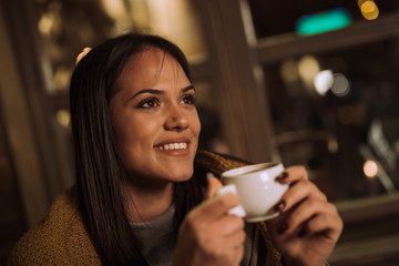 Beautiful woman drinking coffee