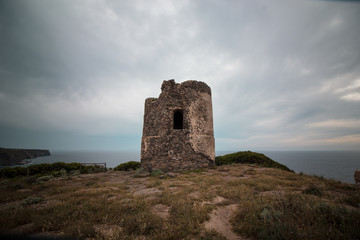 beautiful panorama in Sardinia with an old tower