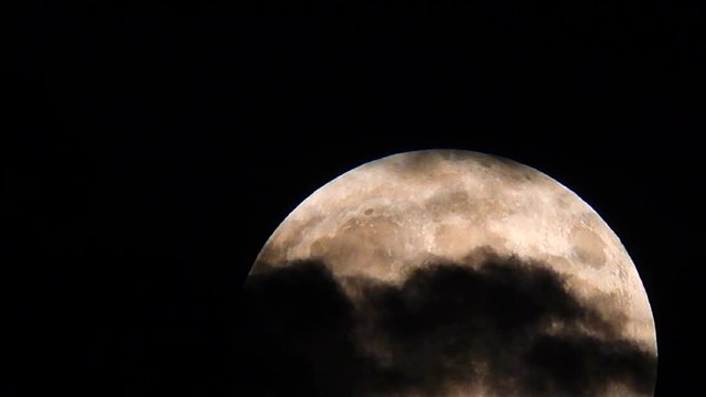 full moon over dark sky with.
