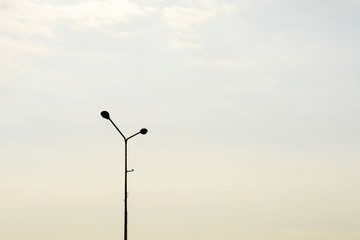 silhouette street lamp post