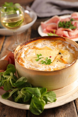 mont d'or, cheese melted with potato and ham