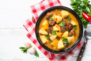 Beef stew with vegetables (goulash) carrot, pototo and pumpkin.