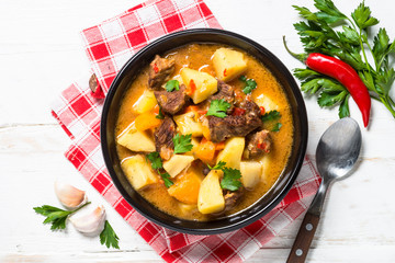Beef stew with vegetables (goulash) carrot, pototo and pumpkin.