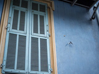 close-up view of window with shutters