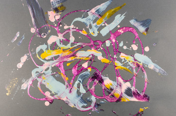 Abstract background with squiggles, spots and scuffs painted with nail polish.