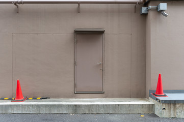 sidewalk by street wall & door