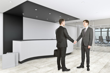Businessmen shaking hands