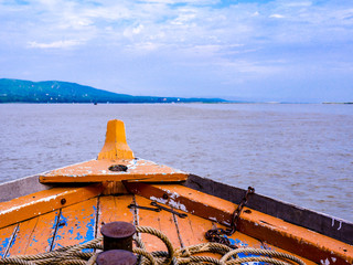 wooden boat Prow heading to destination  