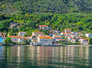 Fototapeta na wymiar Beautiful views of the mountains and the coast in the Bay of Kotor in Montenegro