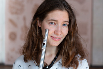 Beautiful young woman with flute Genre portrait of young beautiful girl © biggur