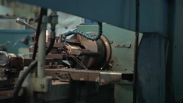 the machine at the factory removes metal chips