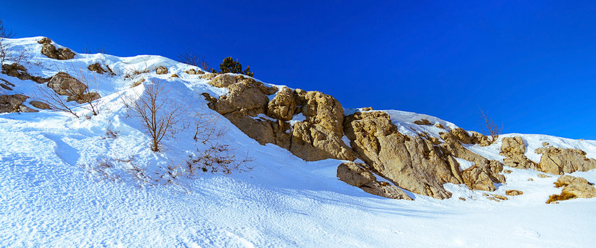 Long panorama of snow mountain on a frosty sunny day, Ai-Petri, Crimea Russia