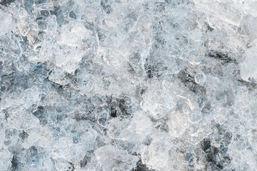 Colorful ice. Abstract Arctic ice texture. Frostwork. Decorative ice crystals. Winter Nature background. The frozen water.