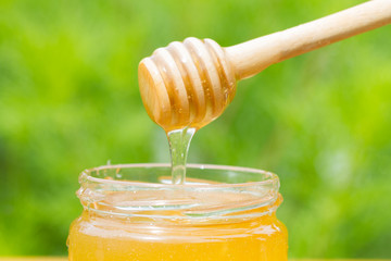 Stick for honey in a glass jar