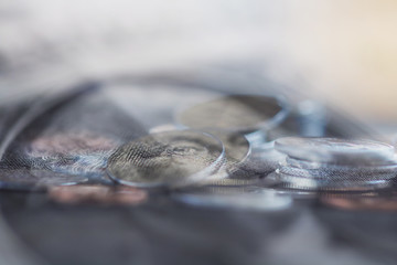 Double exposure Rows of coins of cash,money, dollar on the table,finance and business concept,Tex time soft focus and blurred style,dark tone.