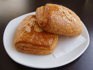 Sweet pastries, flaky croissants with Golden raisins