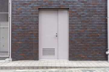 sidewalk by street wall & door