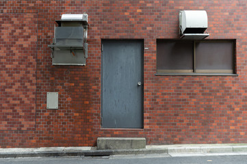 sidewalk by street wall & door