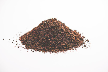 Black Tea Powder or dry dust with or without green leaf and served hot chai in a cup