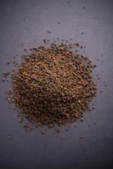 Black Tea Powder or dry dust with or without green leaf and served hot chai in a cup