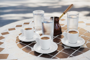 Obraz na płótnie Canvas traditional oriental coffee on a wooden table