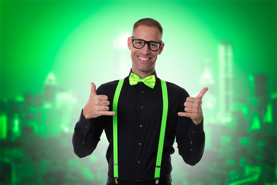 Young boy with black shirt and bow tie and colored suspenders