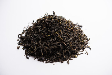 Black Tea Powder or dry dust with or without green leaf and served hot chai in a cup