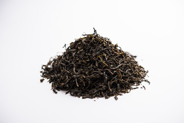 Black Tea Powder or dry dust with or without green leaf and served hot chai in a cup