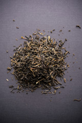 Fototapeta na wymiar Black Tea Powder or dry dust with or without green leaf and served hot chai in a cup