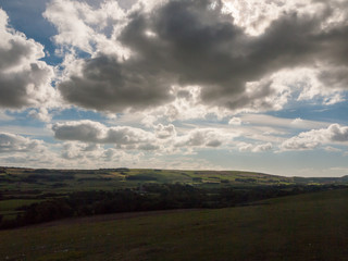 dorset corfe castle field view green landscape open summer day clouds weather clear nature village