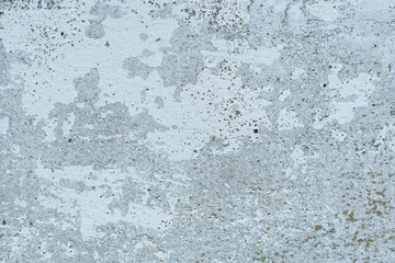 Fototapeta premium Wall fragment with scratches and cracks. It can be used as a background