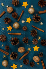 Festive Christmas background of pine cones and decorations