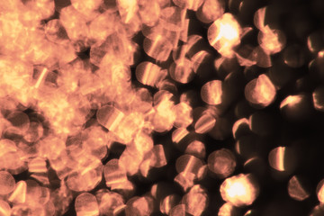 Abstract background with gold sparkles, texture, blur