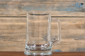 empty beer glass on a wooden background